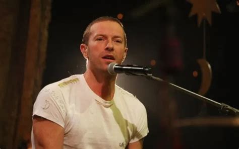 Chris Martin Tattoos - Get all the Details of Chris Martin's Tattoos ...