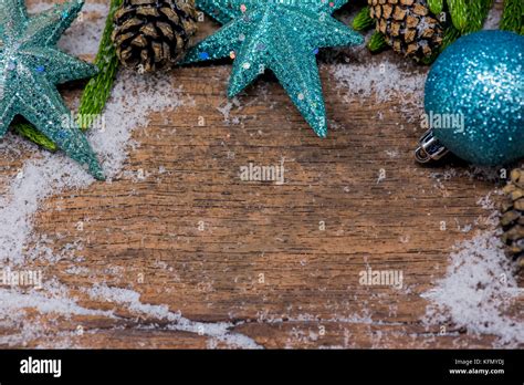 Christmas decoration on wood background with snow Stock Photo - Alamy