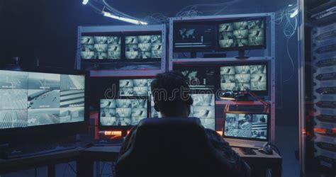 Hacker Watching Multiple Monitors Stock Photo - Image of sitting, checking: 158277032