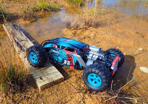 A Radio-controlled Car with a Remote Control. Close-up and Details of a ...