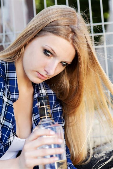 Drunk Young Woman with Bottle of Alcohol Stock Image - Image of ...