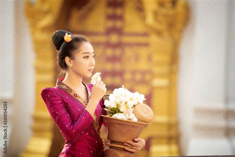 Lao girl dressed in traditional Lao clothes Beautiful Laos girl in Laos ...