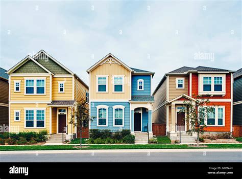 Three Small Houses in Row Stock Photo - Alamy