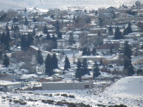 a city with lots of snow on the ground