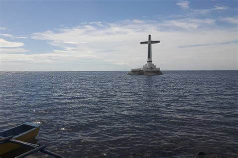 Camiguin's sunken cemetery attracts tourists | ABS-CBN News