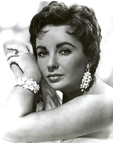 Elizabeth Taylor's dark outlined eyes were due to a rare mutation giving her "double eyelashes"