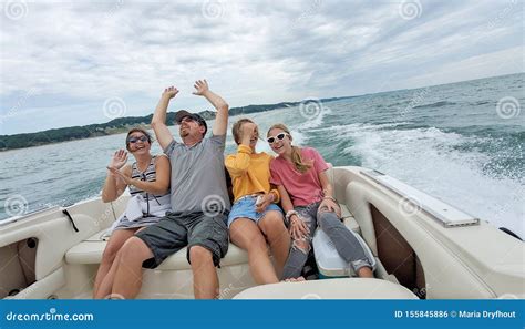 Happy family in power boat stock photo. Image of happy - 155845886