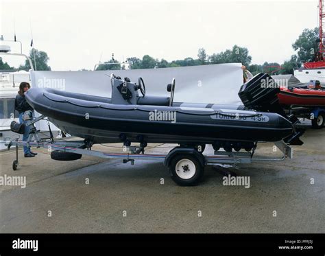 Inflatable dinghy outboard motor hi-res stock photography and images - Alamy