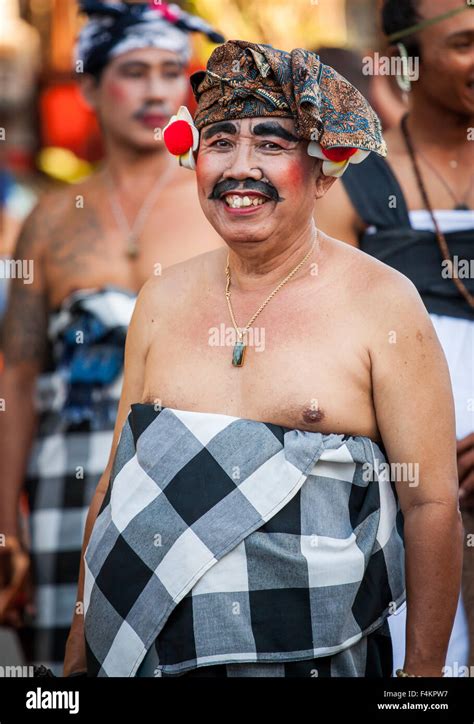 Balinese man in traditional attire at Sanur Village Festival's street Stock Photo, Royalty Free ...