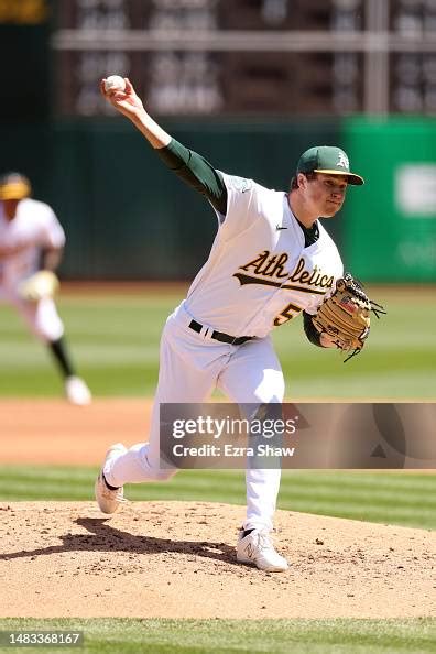 Mason Miller of the Oakland Athletics pitches during the third inning ...