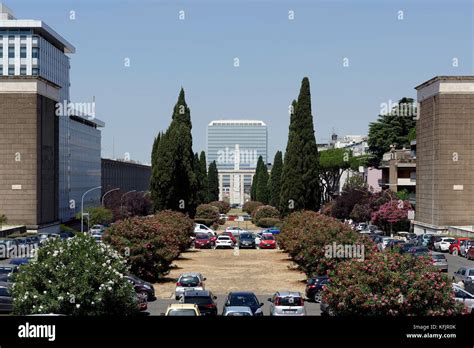 View towards the colonnaded Porch (1939-42, the Obelisk and a Skyscraper in the EUR district ...