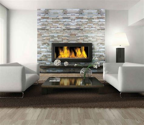 Pin by Wendy Loberg on FIREPLACE FRONTS | Modern stone fireplace, Fireplace design, Contemporary ...