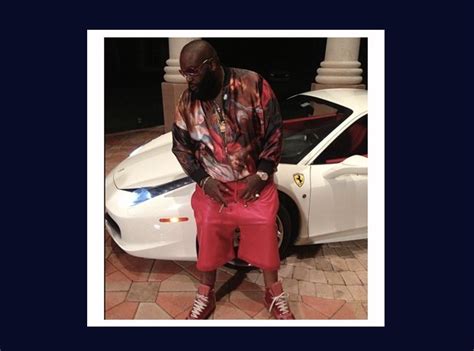 Here's Ross posing with his Ferrari - 23 Of Rick Ross' Most Extravagant... - Capital XTRA