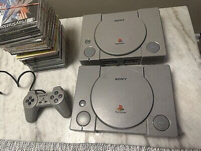 2 CONSOLES PLAYSTATION 1 UNTESTED +CONTROLLER+LOT GAMES-FOR PART OR NOT ...