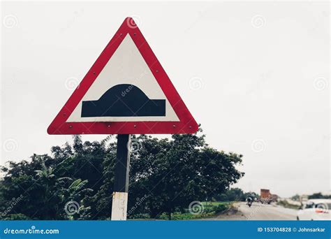 Speed Breaker Sign on the Road Side, Speed Bump Sign Stock Illustration ...