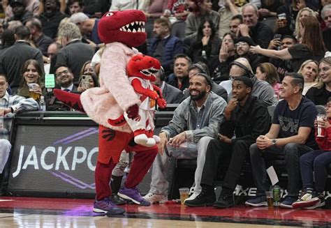 Drake Rocks Teddy Bear Jacket at Raptors Game - Sports Illustrated ...