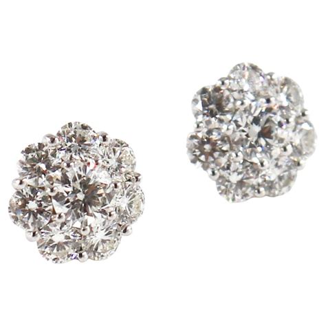 Floral Diamond White Gold Cluster Stud Earrings For Sale at 1stDibs