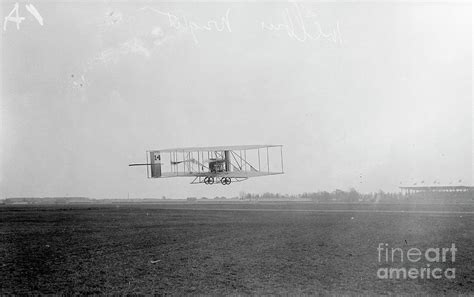 Wright Bros Airplane Flying Above Field Photograph by Bettmann - Fine Art America