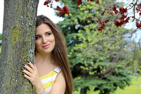 Woman hugging tree stock photo. Image of bloom, leaves - 87637004