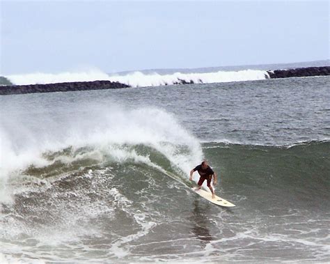 Surfing Hillo Breakwall Hilo Hawaii USA