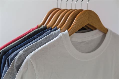 Download Plain Shirts On Clothes Hangers Wallpaper | Wallpapers.com