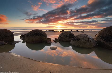 That Moeraki Boulders Sunrise | Moeraki boulders, Beautiful places to visit, Bouldering