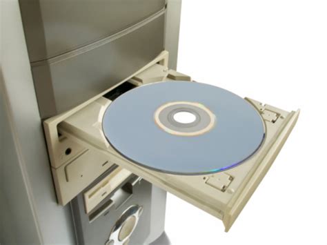 Dvd Cd Disc In Open Drive Stock Photo - Download Image Now - iStock