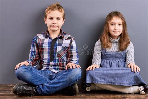 Portrait of Kids with Crossed Legs. Stock Image - Image of home, happiness: 99145285