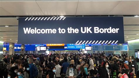 CHAOS at London’s Heathrow Airport as passengers forced to wait for 5 hours in packed queues ...