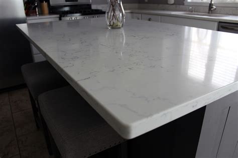 Carrara White Quartz by Aggranite; 502A sink by Midwest/Aggranite ...