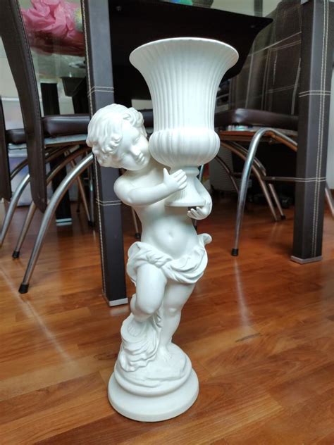 Cupid statue, Furniture & Home Living, Home Decor, Other Home Decor on Carousell