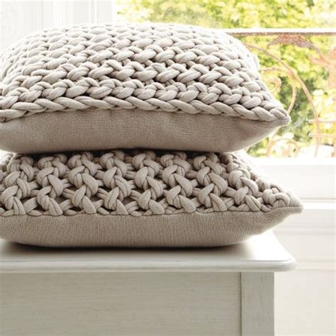 Knitted pillows with fabric backing. Bulky yarn or tee shirt yarn would ...