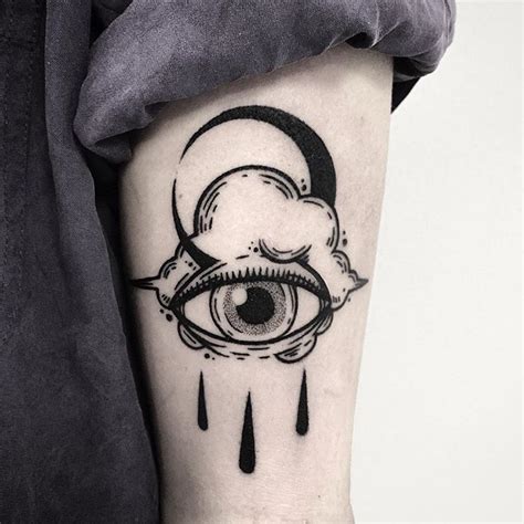 Crying eye cloud and crescent moon tattoo - Tattoogrid.net