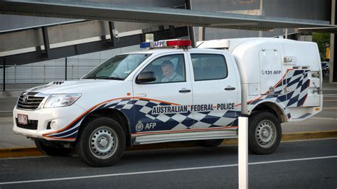 Australian Federal Police - Brisbane Airport | Brisbane airport, Police cars, Police