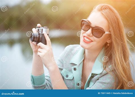 Pretty Young Woman Traveling with Photo Camera and Making Pictures Stock Image - Image of ...