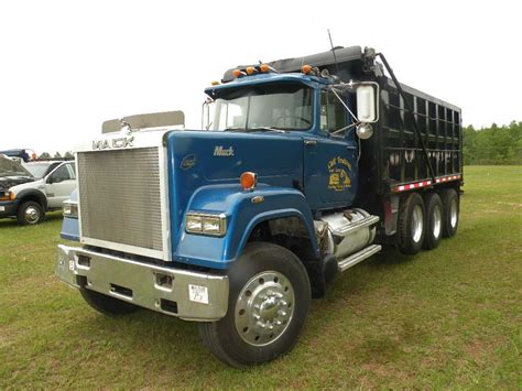 1986 MACK RW 713 TRI AXLE DUMP TRUCK - J.M. Wood Auction Company, Inc.