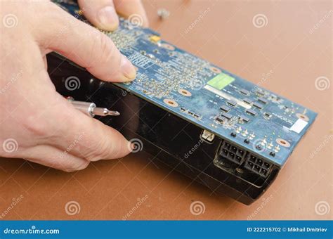 Repair, Maintenance of Computers Concept. Graphics Card on a Bro Stock ...