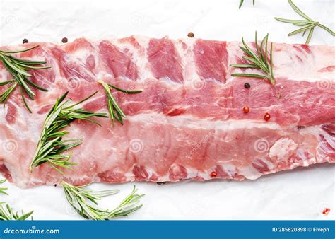 Raw Pork Ribs with Rosemary, Pepper, Salt and Spices Prepared for ...