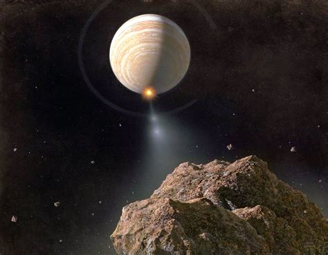 Massive chunks of comet Shoemaker-Levy 9 hurtle toward Jupiter, pictured in 1994 NASA art by Don ...