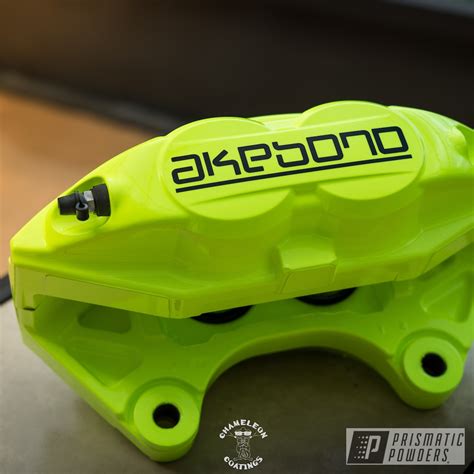 Akebono Brake Calipers done in Neon Yellow | Prismatic Powders