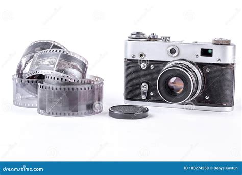 Old film tape and camera. stock photo. Image of background - 103274258