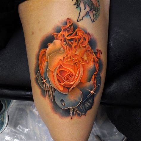 Fire and ice rose I did on the front of the thigh of my