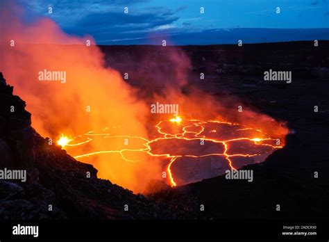 Halemaumau lava lake. Glowing lava lake in Halemaumau volcanic crater ...