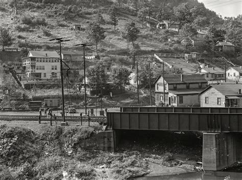 September 1938. "Section of coal mining town near Welch, West Virginia." Possibly the mountain ...