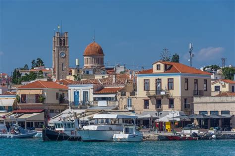 Port of Aegina Town with Yachts and Fishermen Boats Docked in Aegina ...