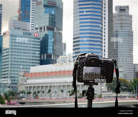 Singapore - Dec 14, 2015. A DSLR camera on waterfront in Singapore ...