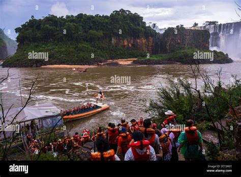 Boat ride under the waterfalls at Iguazu Falls (aka Iguassu Falls or Cataratas del Iguazu ...