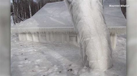 Winter storm in New York nearly turns beach homes into ice homes