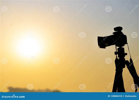 Camera on a tripod stock photo. Image of camera, digital - 128884418