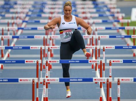 A Belgian shot-putter hops over hurdles after answering her team's call for help | Georgia ...